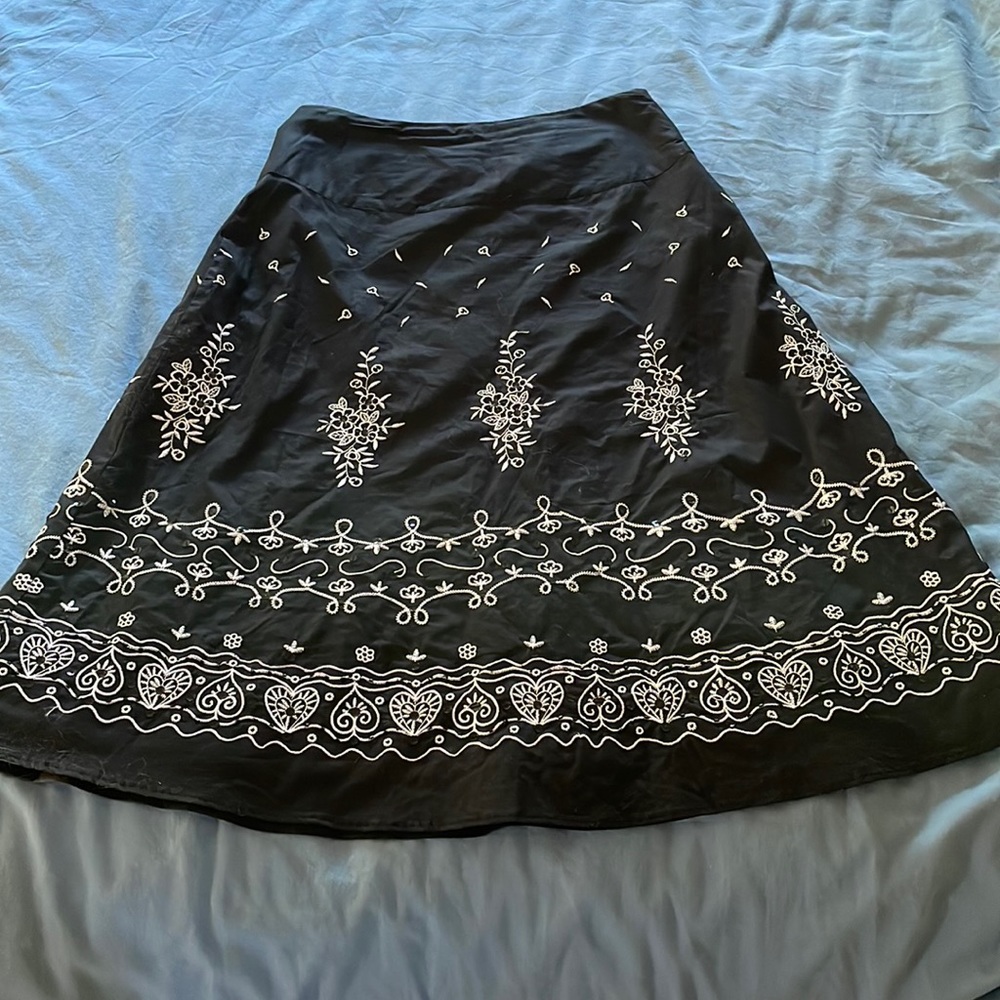 Black skirt with white embroidery